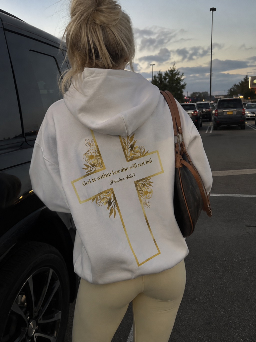 God is within her hoodie